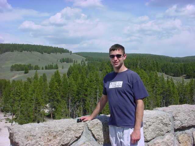 Picture of me standing in front of a long hill.